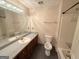 Bathroom featuring a large mirror and vanity plus a shower/tub combo at 601 Clubland Se Cir, Conyers, GA 30094