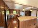 Spacious kitchen with stainless steel appliances, an island with a cooktop, and rich wood cabinetry at 601 Clubland Se Cir, Conyers, GA 30094