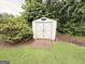 Exterior of storage shed with a wooden ramp at 601 Clubland Se Cir, Conyers, GA 30094