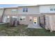 Backyard area with a small concrete patio and wooden fence at 1650 Larkspur Trl, Conyers, GA 30012