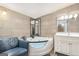 Beautiful bathroom features a large tub and modern vanity at 340 Loblolly Rdg, Locust Grove, GA 30248
