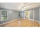 Bright primary bedroom featuring wood laminate flooring at 340 Loblolly Rdg, Locust Grove, GA 30248