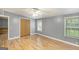 Comfortable bedroom features a closet and wood laminate flooring at 340 Loblolly Rdg, Locust Grove, GA 30248