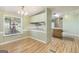 Cozy dining area boasts wood-look floors and natural light from the window at 340 Loblolly Rdg, Locust Grove, GA 30248