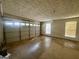 A spacious garage with an electric door and window at 955 Foxworthy Ln, Riverdale, GA 30296