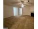 This Living Room features a fireplace and ceiling fan at 955 Foxworthy Ln, Riverdale, GA 30296