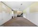 Unfinished basement area showcasing stairs leading to the upper level at 207 Conkle Rd, Hampton, GA 30228