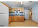 Functional kitchen with wooden cabinets, laminate countertops, and room for appliances at 207 Conkle Rd, Hampton, GA 30228