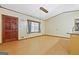 A open living room with wood floors at 207 Conkle Rd, Hampton, GA 30228