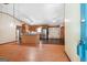 A open living room with wood floors and ceiling fan at 207 Conkle Rd, Hampton, GA 30228