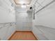 Spacious walk-in closet with ample shelving, providing plenty of storage for clothes and accessories at 207 Conkle Rd, Hampton, GA 30228