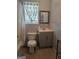 Standard bathroom with a toilet, vanity with mirror and shower-tub combo at 443 Walker St, Villa Rica, GA 30180