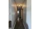 Hallway with wood flooring leading to bathroom at 443 Walker St, Villa Rica, GA 30180