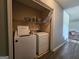 Laundry room featuring standard washer and dryer units on the ground floor at 443 Walker St, Villa Rica, GA 30180