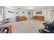 Large basement living area, with sofas and seating, perfect for entertainment and relaxation at 5585 Lavender Farms, Powder Springs, GA 30127