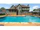 Inviting backyard pool and deck area perfect for outdoor entertaining and summer fun at 5585 Lavender Farms, Powder Springs, GA 30127