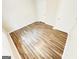 Bedroom with wood-look flooring and two doors for closet/bathroom access at 8201 Fairington Village Dr, Lithonia, GA 30034