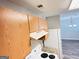 Cozy kitchen with light wood cabinets and modern appliances at 8201 Fairington Village Dr, Lithonia, GA 30034