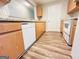 Well-designed kitchen with modern appliances and laminate flooring at 8201 Fairington Village Dr, Lithonia, GA 30034