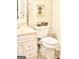 Cozy bathroom features a white vanity and toilet with a modern bidet at 150 Ashley Dr, Fayetteville, GA 30214