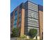 Modern Trilith Guesthouse building with a blend of brick and glass, showcasing contemporary design and inviting accommodations at 150 Ashley Dr, Fayetteville, GA 30214
