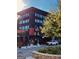Modern building with a stone block road with Enzo Steakhouse & Bar on the ground floor at 150 Ashley Dr, Fayetteville, GA 30214