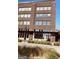 Brown brick building exterior with large windows and storefront at 150 Ashley Dr, Fayetteville, GA 30214