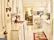 Bright kitchen with white cabinets, updated appliances and an open dining area at 150 Ashley Dr, Fayetteville, GA 30214