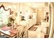 Spacious kitchen features white cabinetry, modern appliances, and adjacent dining area at 150 Ashley Dr, Fayetteville, GA 30214