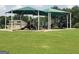 Community playground featuring slides, climbing structures, and shaded areas at 150 Ashley Dr, Fayetteville, GA 30214