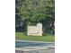 Fayette County Main Street Welcome Center and Development Authority sign displayed in front of a green lawn and trees at 150 Ashley Dr, Fayetteville, GA 30214