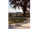 Trilith Studio buildings visible behind a wooden fence, surrounded by greenery at 150 Ashley Dr, Fayetteville, GA 30214