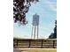 Trilith Studios water tower framed by trees and blue skies at 150 Ashley Dr, Fayetteville, GA 30214