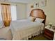 Serene bedroom with warm lighting, cozy bedding, and simple decor, create a relaxing retreat at 3219 Fairington Dr, Lithonia, GA 30038