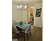 Cozy dining area adjacent to the kitchen, featuring stylish decor and ample seating for four at 3219 Fairington Dr, Lithonia, GA 30038