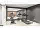 Home gym featuring modern exercise equipment and a large mirror at Lot 1 Bohannon Drive # 1, Fairburn, GA 30213