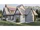 Stylish exterior elevation with varied textures, including stone and wood, with a cozy front porch at Lot 1 Bohannon Drive # 1, Fairburn, GA 30213