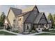 Charming exterior elevation featuring wood and stone finishes, complemented by professional landscaping at Lot 1 Bohannon Drive # 1, Fairburn, GA 30213