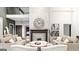 Stylish living room with a stone fireplace, comfortable seating, and an open-concept design at Lot 1 Bohannon Drive # 1, Fairburn, GA 30213