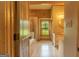 View of the bathroom with neutral tile, jacuzzi tub, and wood accents at 1051 Lake Rutledge Rd, Rutledge, GA 30663