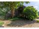 Cozy home exterior with a inviting porch, wood fence, and lush surroundings at 1051 Lake Rutledge Rd, Rutledge, GA 30663