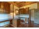 A well-lit office space with custom wood cabinetry and wood floors adds natural charm to this home at 1051 Lake Rutledge Rd, Rutledge, GA 30663
