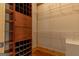 Walk-in closet featuring built-in shelving and hardwood floors at 1051 Lake Rutledge Rd, Rutledge, GA 30663