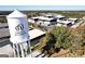Aerial view of Trilith Studios with its water tower and multiple buildings with loading docks at 285 Acton Dr, Fayetteville, GA 30215