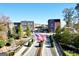 Elevated street view featuring The Trilith Guesthouse with surrounding landscaping and water features at 285 Acton Dr, Fayetteville, GA 30215