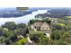 Beautiful home near Lake Horton, surrounded by a lush green landscape with mature trees and plenty of privacy at 285 Acton Dr, Fayetteville, GA 30215