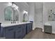 Stylish bathroom featuring double vanities with modern fixtures, ample lighting, and contemporary design at 285 Acton Dr, Fayetteville, GA 30215