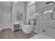 Elegant bathroom with a soaking tub, walk-in shower, and modern fixtures, creating a spa-like retreat at 285 Acton Dr, Fayetteville, GA 30215
