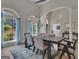 Beautiful dining room featuring large windows with natural light and stylish modern decor at 285 Acton Dr, Fayetteville, GA 30215