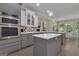 Bright kitchen featuring an island, stainless steel appliances, and light and dark cabinetry at 285 Acton Dr, Fayetteville, GA 30215